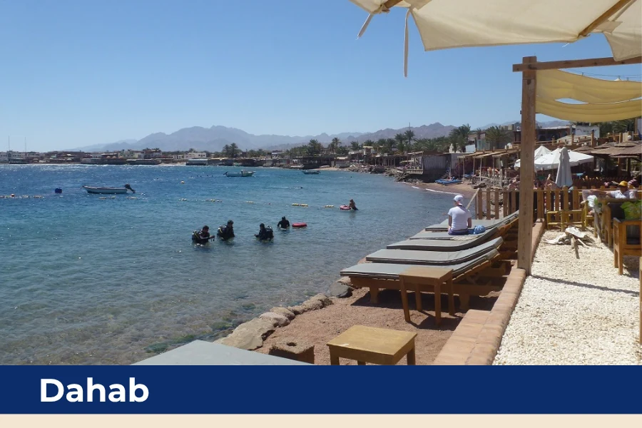 Coastline and divers in Dahab, Egypt